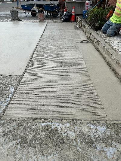 Finished concrete pavement panel